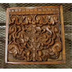 Wooden carved panel