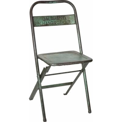Green metal folding stool